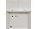 Utility room showing water hookups and cabinetry at 120 Arrowood Ln, Alpharetta, GA 30009