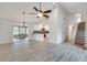 Open concept home with a living room open to the kitchen, and a dining area at 120 Arrowood Ln, Alpharetta, GA 30009