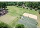 Outdoor basketball court for friendly games, surrounded by lush greenery at 203 Bent Oak Ln, Woodstock, GA 30189