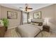 Cozy bedroom with decor and neutral color palette at 203 Bent Oak Ln, Woodstock, GA 30189