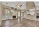 Open-concept living room with fireplace at 203 Bent Oak Ln, Woodstock, GA 30189