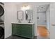 Modern bathroom with dual vanity, marble countertop, and gold accents at 207 Garrison Se Rd, Marietta, GA 30008
