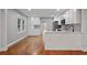 Bright kitchen with white cabinets, modern appliances, and hardwood floors at 207 Garrison Se Rd, Marietta, GA 30008