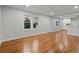 Large living room features hardwood floors and neutral walls for a cozy ambiance at 207 Garrison Se Rd, Marietta, GA 30008