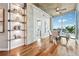 Dining area with city views and modern shelving unit with decorative items at 3324 Peachtree Ne Rd # 1219, Atlanta, GA 30326