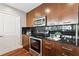 A stylish kitchen showcases dark backsplash, sleek cabinets, and stainless steel oven at 3324 Peachtree Ne Rd # 1219, Atlanta, GA 30326