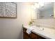 Bathroom features a vanity with granite countertop, sink, faucet and mirror at 3710 Oregon Trl, Decatur, GA 30032