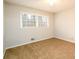 A light and airy bedroom with a ceiling fan and a large window at 3710 Oregon Trl, Decatur, GA 30032