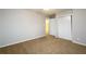 Bedroom with closet and neutral walls and carpet at 3710 Oregon Trl, Decatur, GA 30032