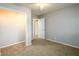 A light and airy bedroom with neutral walls and carpet at 3710 Oregon Trl, Decatur, GA 30032