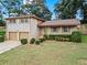 Charming two-story brick home with well-manicured landscaping and a two car garage at 3710 Oregon Trl, Decatur, GA 30032