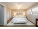 This primary bedroom features neutral walls, soft carpet and a ceiling fan at 3710 Oregon Trl, Decatur, GA 30032