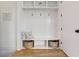 Mudroom with bench seating, storage baskets, and coat hooks at 100 5Th St, Fayetteville, GA 30214