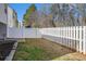 Well-maintained backyard with a white privacy fence and a small patio area at 5545 Mountain Top Pl, Cumming, GA 30041