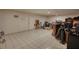 Spacious basement with tile flooring, and packed with furniture and appliances at 744 Hampton Locust Grove Rd, Hampton, GA 30228