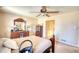 Relaxing main bedroom features a ceiling fan, carpet and ample closet space at 744 Hampton Locust Grove Rd, Hampton, GA 30228