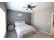 Comfortable bedroom with a ceiling fan and lots of natural light at 1365 Willis Lake Dr, Kennesaw, GA 30152
