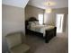 Cozy bedroom featuring a dark wood bed frame, soft lighting, and ensuite access at 1365 Willis Lake Dr, Kennesaw, GA 30152