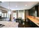 Kitchen featuring granite counters, stainless appliances and dark wood cabinetry at 1365 Willis Lake Dr, Kennesaw, GA 30152