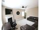 Comfortable living room with modern fireplace, flat screen tv, sectional sofa and built in desk at 1365 Willis Lake Dr, Kennesaw, GA 30152