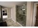 Modern bathroom with a frameless shower featuring a built-in bench and tiled surround at 1365 Willis Lake Dr, Kennesaw, GA 30152