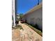 Flagstone walkway with lush landscaping along the side of the house at 1580 Reids Ferry Way, Marietta, GA 30062