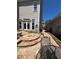 Cozy backyard with a flagstone patio, lush landscaping, and comfortable seating at 1580 Reids Ferry Way, Marietta, GA 30062