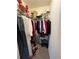 Well organized closet with shelving and hanging clothes at 1580 Reids Ferry Way, Marietta, GA 30062