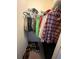 Walk-in closet with hanging clothes, storage shelves and shoe storage at 1580 Reids Ferry Way, Marietta, GA 30062