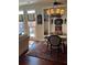 Bright dining area featuring hardwood floors, natural light, and an elegant chandelier at 1580 Reids Ferry Way, Marietta, GA 30062