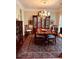 Formal dining room featuring classic furniture, a chandelier, and an elegant rug at 1580 Reids Ferry Way, Marietta, GA 30062