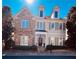 Charming two-story home featuring a stone facade and dormer windows, plus a welcoming front porch at 1580 Reids Ferry Way, Marietta, GA 30062