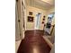 Upstairs hallway with hardwood floors connects bedrooms and bathrooms at 1580 Reids Ferry Way, Marietta, GA 30062