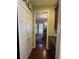 Hallway view features a storage closet and leads into a dining room at 1580 Reids Ferry Way, Marietta, GA 30062