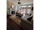 Cozy living room featuring a fireplace, hardwood floors, and comfortable seating at 1580 Reids Ferry Way, Marietta, GA 30062