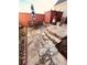 Stone patio with stairs and landscaping creates a charming outdoor living space, complete with a seating area and garden at 1580 Reids Ferry Way, Marietta, GA 30062