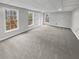 Spacious basement rec room with carpet and bright windows at 1935 Wenton Pl, Lawrenceville, GA 30044