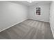 Bright bedroom with a large window that brings in lots of natural light at 1935 Wenton Pl, Lawrenceville, GA 30044