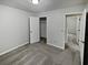 Bedroom with carpet, closet, and connecting doors at 1935 Wenton Pl, Lawrenceville, GA 30044