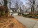 Charming two-story home with a two-car garage, basketball hoop, and well-maintained landscaping at 1935 Wenton Pl, Lawrenceville, GA 30044