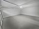Spacious garage with ample room for parking and storage at 1935 Wenton Pl, Lawrenceville, GA 30044