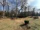 Large backyard with mature trees and some landscaping features, offering a peaceful outdoor space at 804 Maynard Ter, Atlanta, GA 30316