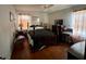 A bedroom with hardwood floors, vintage furnishings, and natural light from the window at 804 Maynard Ter, Atlanta, GA 30316