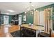 Open-concept dining area with hardwood floors and direct access to the kitchen at 1322 Elmhurst Circle Se Cir, Atlanta, GA 30316