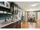 Lovely kitchen features granite countertops, dark wood cabinets, and stainless steel sink at 1322 Elmhurst Circle Se Cir, Atlanta, GA 30316