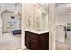 Bathroom featuring a vanity, mirror and access to the bedroom at 3815 Beaver Swamp Rd, Loganville, GA 30052