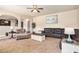 Open-concept living room provides ample space and a view of the kitchen at 3815 Beaver Swamp Rd, Loganville, GA 30052