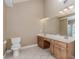 Bathroom featuring double vanity, tile floors, and natural light at 4900 Raquet Ct, Duluth, GA 30096