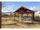 Community pavilion with picnic tables and string lights, an ideal spot for outdoor gatherings and events at 5603 Hislop Ln # 79, Mableton, GA 30126