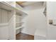 Walk-in closet with built-in shelving and ample storage space at 6700 Roswell Rd # 11B, Atlanta, GA 30328